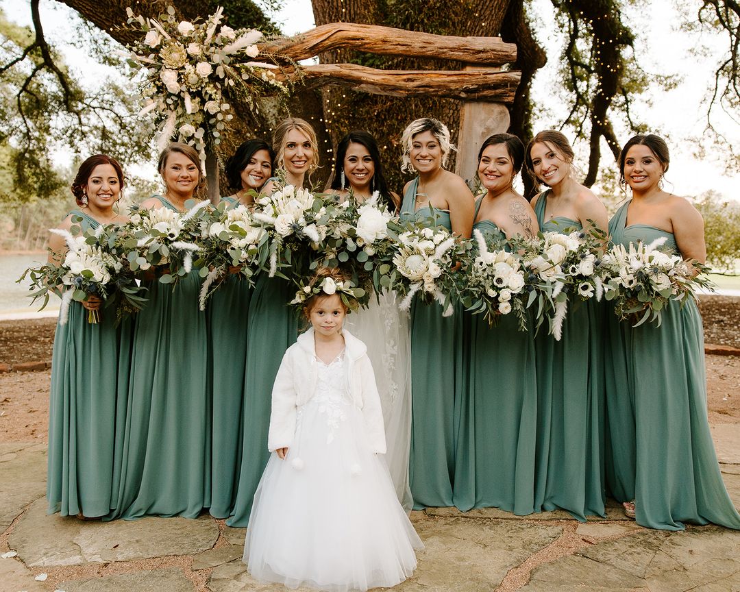 sage bridesmaids with boho bouquets