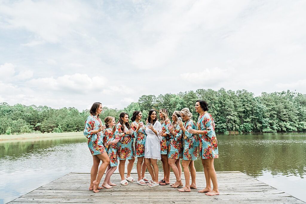 4 bridesmaids in robes lakeside OPT