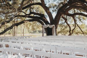 Outdoor luxury wedding ceremony by the lake near Houston Texas