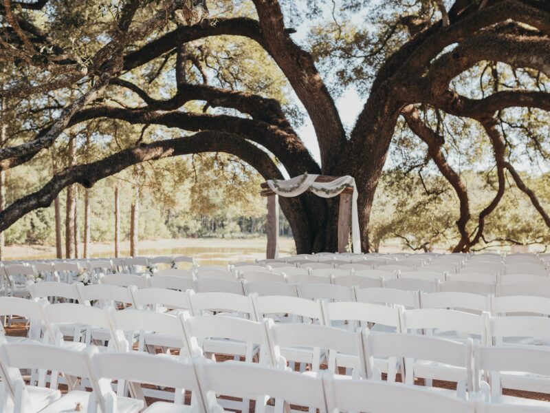 Outdoor luxury wedding ceremony by the lake near Houston Texas