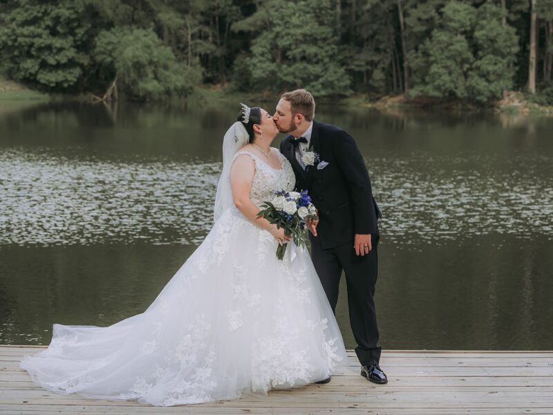 “Bride and groom touring a Houston wedding venue with their wedding planner discussing ceremony layout options