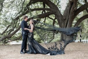 Bride wearing black wedding dress at an all inclusive, affordable wedding venue near Houston
