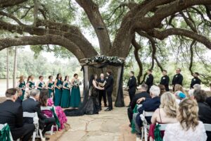 Wedding guests seated for outdoor ceremony at Pine Lake Ranch wedding venue with lake views and natural surroundings