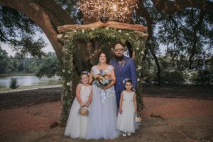 101 Things To Do In Houston 5 Family friendly wedding venue with bride and flower girls posing for wedding day photos